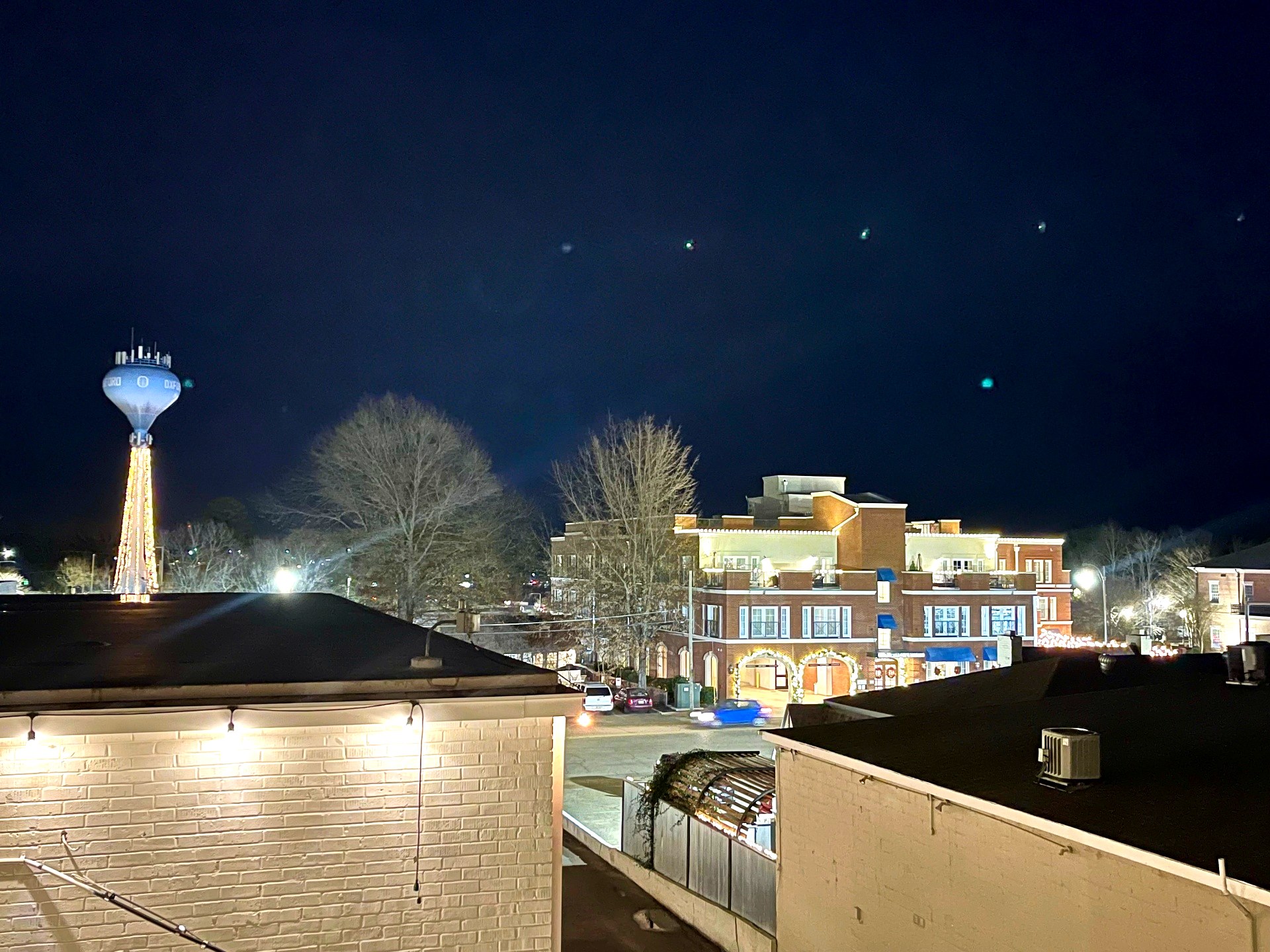 Nighttime view from the condo over the Oxford Square and water tower